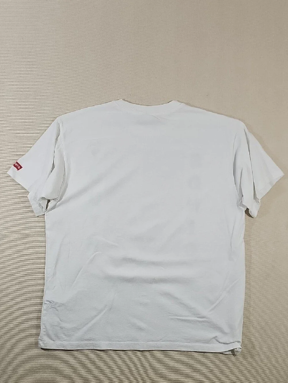 Levi's White Sonic Youth Graphic Tee with Yellow and Purple Characters